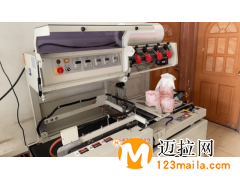 東光全自動熱收縮包裝機覆膜機生產(chǎn)廠家